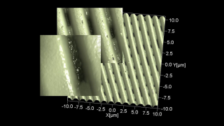 Information is stored on CDs by real physical holes in the plastic surface below the reflective aluminum foil. The laser holes on CD-Rs and DVD-Rs we 'burn' at home probably look a bit different from the molded ones on mastered CDs.